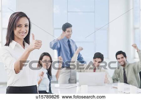 Stock Photograph - Business executives celebrating their success. Fotosearch
