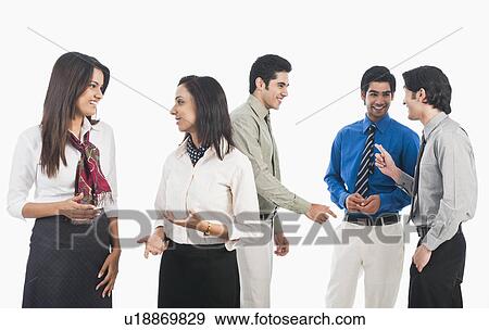 Stock Photo - Business executives discussing. Fotosearch