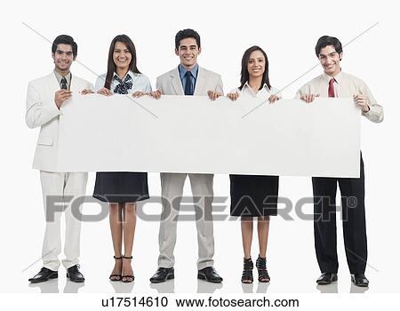 Business executives holding a placard View Large Photo Image Stock Image - Business executives holding a placard. Fotosearch