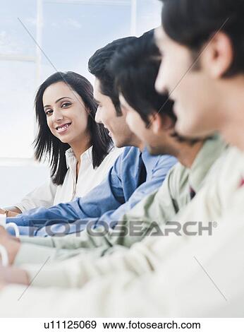 Business executives in a meeting View Large Photo Image Stock Photo - Business executives in a meeting. Fotosearch