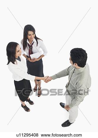Business executives shaking hands View Large Photo Image Stock Photo - Business executives shaking hands. Fotosearch