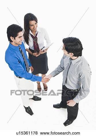 Business executives shaking hands View Large Photo Image Stock Photo - Business executives shaking hands. Fotosearch