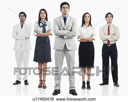 Business executives standing with arms crossed View Large Photo Image Stock Photo - Business executives standing with arms crossed. Fotosearch