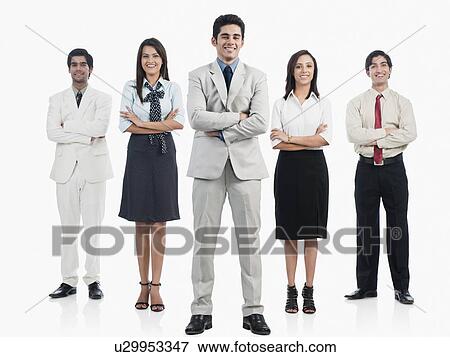 Business executives standing with arms crossed View Large Photo Image Stock Photo - Business executives standing with arms crossed. Fotosearch