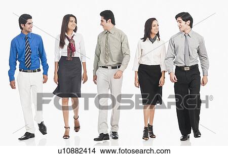 Picture - Business executives walking together. Fotosearch