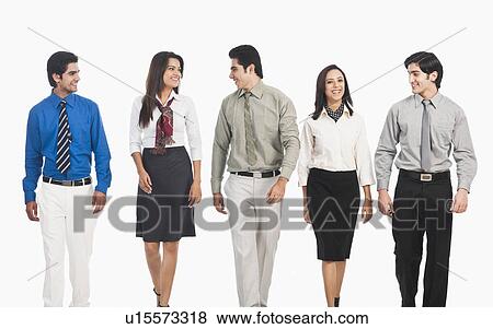 Stock Photo - Business executives walking together. Fotosearch