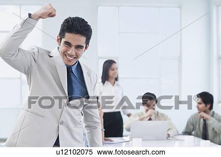 Businessman celebrating his success View Large Photo Image Stock Photography - Businessman celebrating his success. Fotosearch