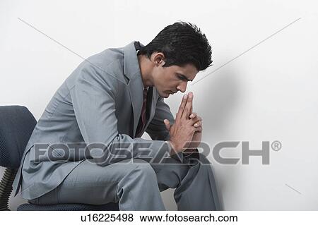 Businessman looking worried View Large Photo Image Stock Photo - Businessman looking worried. Fotosearch