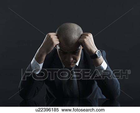 Businessman looking worried View Large Photo Image Stock Photography - Businessman looking worried. Fotosearch