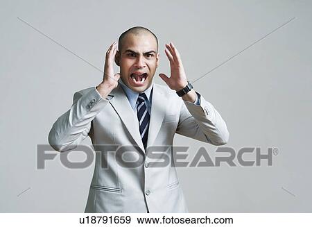 Stock Photo - Businessman shouting. Fotosearch