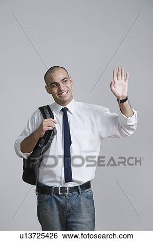 Stock Photograph - Businessman waving his hand. Fotosearch