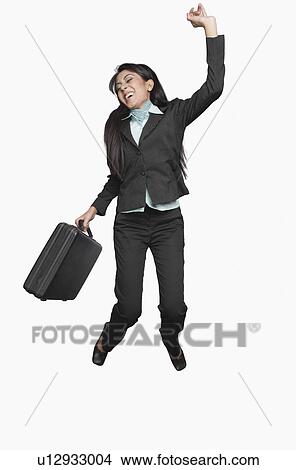 Picture - Businesswoman jumping. Fotosearch