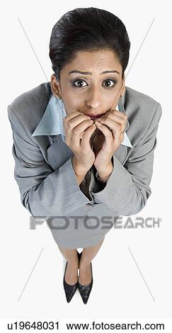 Businesswoman looking terrified View Large Photo Image Stock Image - Businesswoman looking terrified. Fotosearch