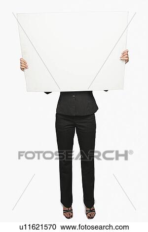 Businesswoman showing a placard View Large Photo Image Stock Image - Businesswoman showing a placard. Fotosearch