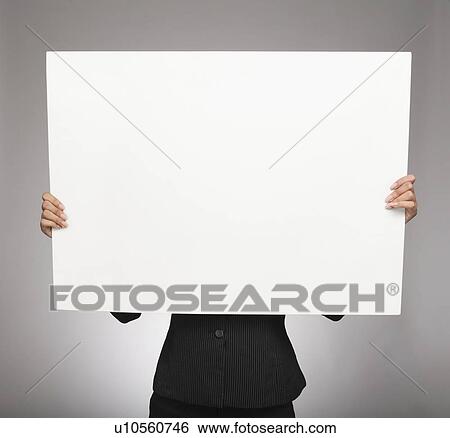 Businesswoman showing a placard View Large Photo Image Stock Photograph - Businesswoman showing a placard. Fotosearch