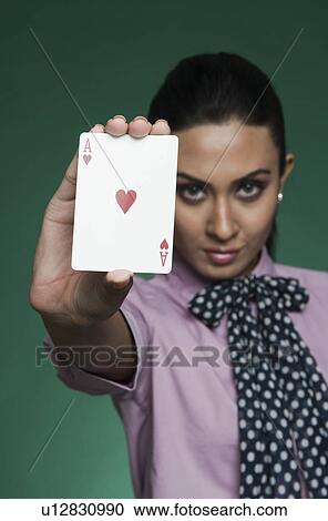Businesswoman showing ace of hearts View Large Photo Image Stock Image - Businesswoman showing ace of hearts. Fotosearch