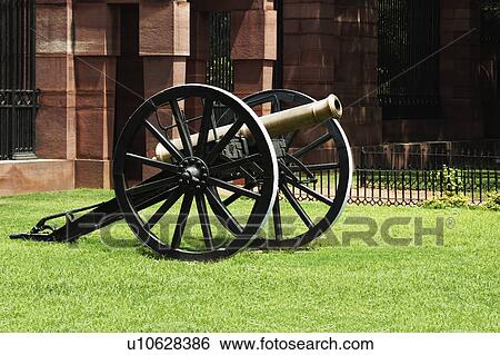 Stock Photograph - Cannon at the fort of a government building, Rashtrapati Bhavan, Rajpath, New Delhi, India. Fotosearch