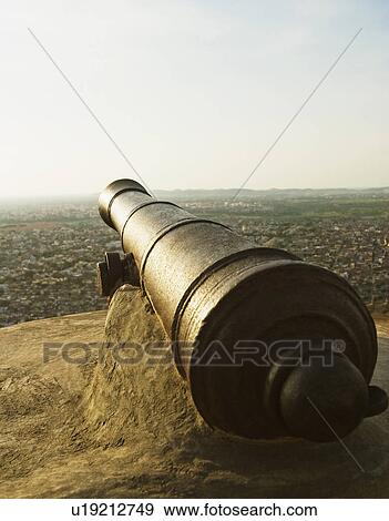 Cannon in a fort with cityscape, Nahargarh Fort, Jaipur, Rajasthan, India View Large Photo Image Stock Photo - Cannon in a fort with cityscape, Nahargarh Fort, Jaipur, Rajasthan, India. Fotosearch