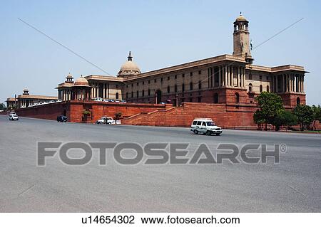 Cars moving on the road in front of a government building, Rashtrapati Bhavan, Rajpath, New Delhi, India View Large Photo Image Stock Image - Cars moving on the road in front of a government building, Rashtrapati Bhavan, Rajpath, New Delhi, India. Fotosearch