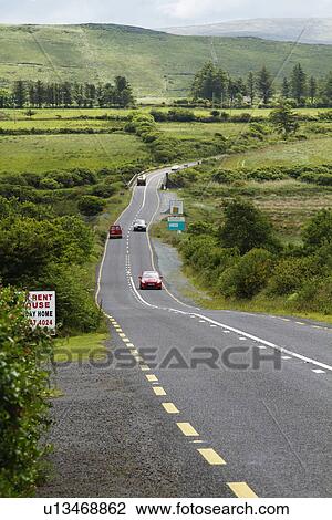 Cars on the road, Ring Of Kerry, County Kerry, Republic of Ireland View Large Photo Image Stock Image - Cars on the road, Ring Of Kerry, County Kerry, Republic of Ireland. Fotosearch