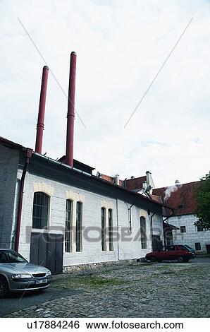 Stock Photograph - Cars parked in front of a brewery, Eggenberg, Cesky Krumlov, South Bohemian Region, Czech Republic. Fotosearch