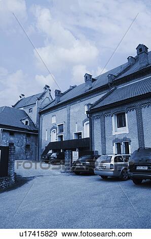Stock Photo - Cars parked in front of buildings, Cesky Krumlov, South Bohemian Region, Czech Republic. Fotosearch