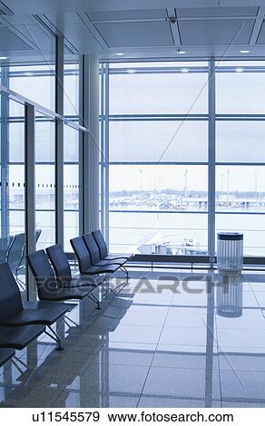 Stock Photo - Chairs at an airport lounge, Paris, France. Fotosearch