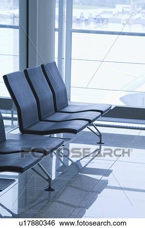Chairs at an airport lounge, Paris, France View Large Photo Image Stock Photograph - Chairs at an airport lounge, Paris, France. Fotosearch