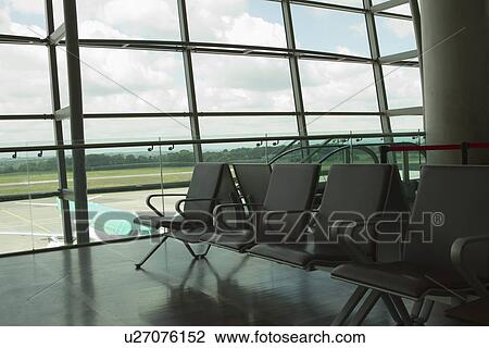 Stock Image - Chairs in an airport lounge, Cork Airport, Cork, County Cork, Republic of Ireland. Fotosearch