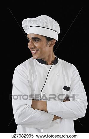 Chef standing with arms crossed View Large Photo Image Stock Photography - Chef standing with arms crossed. Fotosearch