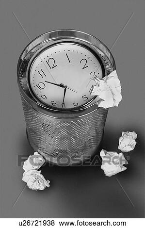 Clock in the trash can View Large Photo Image Stock Photo - Clock in the trash can. Fotosearch