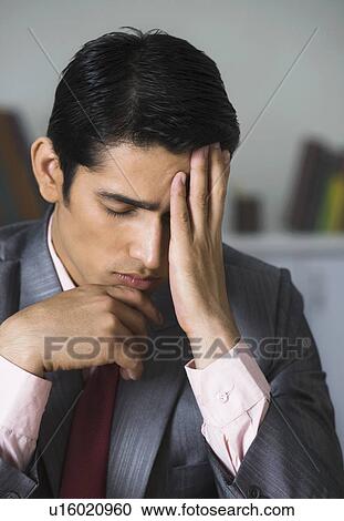 Close-up of a businessman looking disappointed View Large Photo Image Stock Image - Close-up of a businessman looking disappointed. Fotosearch