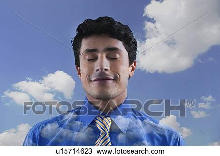 Close-up of a businessman with his eyes closed View Large Photo Image Stock Image - Close-up of a businessman with his eyes closed. Fotosearch