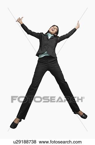 Stock Photo - Close-up of a businesswoman cheering. Fotosearch