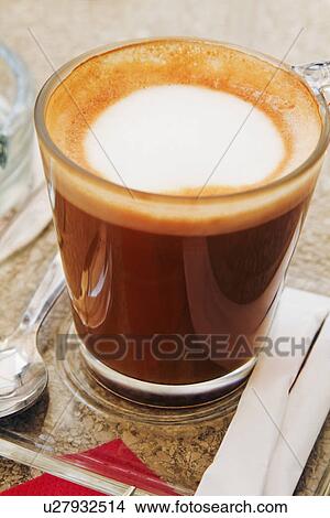 Picture - Close-up of a glass of cappuccino. Fotosearch