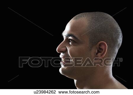 Close-up of a man smiling View Large Photo Image Stock Image - Close-up of a man smiling. Fotosearch