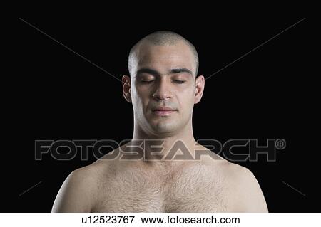 Close-up of a man with his eyes closed View Large Photo Image Stock Photo - Close-up of a man with his eyes closed. Fotosearch