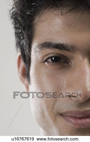 Close-up of a man's face View Large Photo Image Stock Photo - Close-up of a man's face. Fotosearch