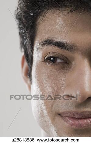 Stock Photograph - Close-up of a man's face. Fotosearch