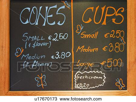 Stock Image - Close-up of a menu board at a restaurant, Ireland. Fotosearch
