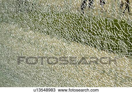 Close-up of a shattered glass View Large Photo Image Stock Image - Close-up of a shattered glass. Fotosearch