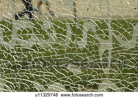 Close-up of a shattered glass View Large Photo Image Stock Photo - Close-up of a shattered glass. Fotosearch