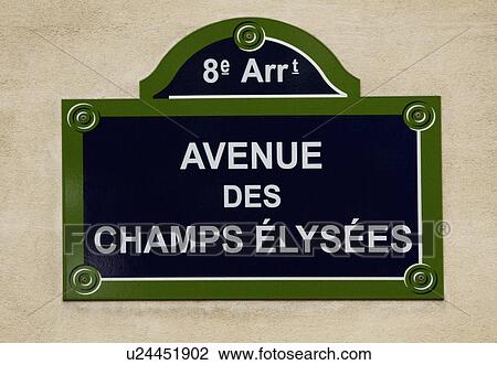 Stock Image - Close-up of a street name sign, Avenue des Champs-Elysees, Paris, France. Fotosearch