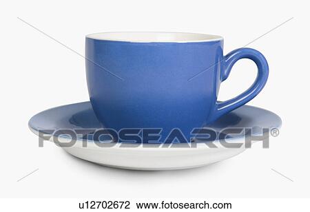 Stock Image - Close-up of a tea cup with a saucer. Fotosearch