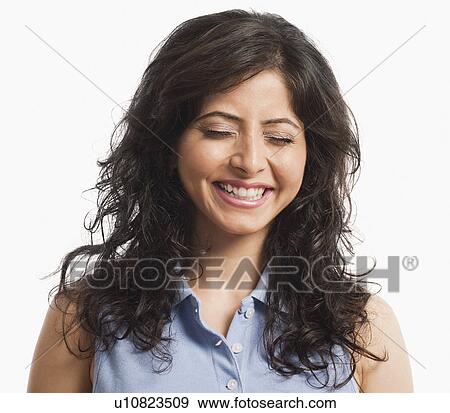 Close-up of a woman laughing with eyes closed View Large Photo Image Stock Photo - Close-up of a woman laughing with eyes closed. Fotosearch