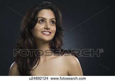 Close-up of a woman smiling View Large Photo Image Picture - Close-up of a woman smiling. Fotosearch