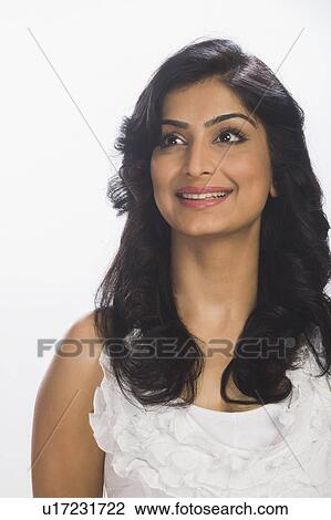 Close-up of a woman smiling View Large Photo Image Stock Image - Close-up of a woman smiling. Fotosearch