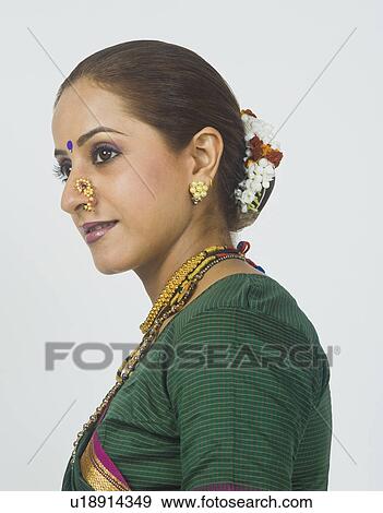 Close-up of a woman smiling View Large Photo Image Stock Photo - Close-up of a woman smiling. Fotosearch