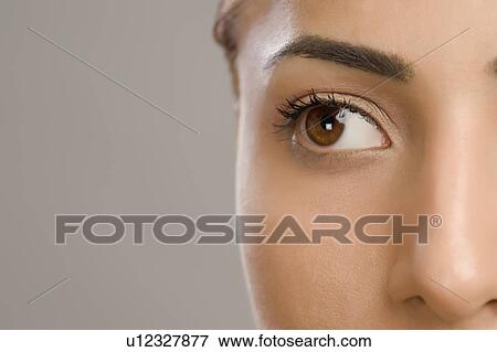 Close-up of a woman's face View Large Photo Image Stock Photo - Close-up of a woman's face. Fotosearch