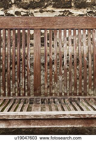 Stock Image - Close-up of a wooden bench, Oxford, Oxfordshire, England. Fotosearch